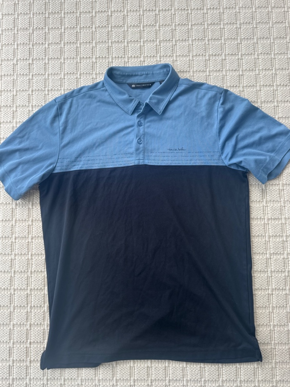 Travis Mathew Two-Tone Light Blue and Black Polo